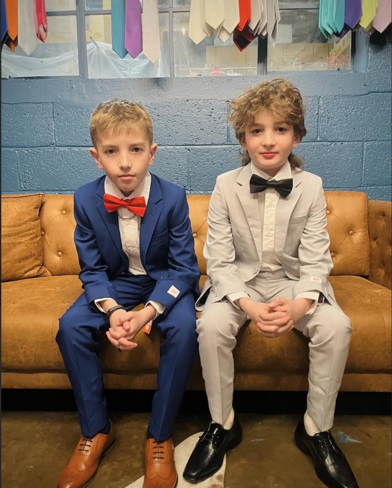 Two boys in suits at Mr S Clothing