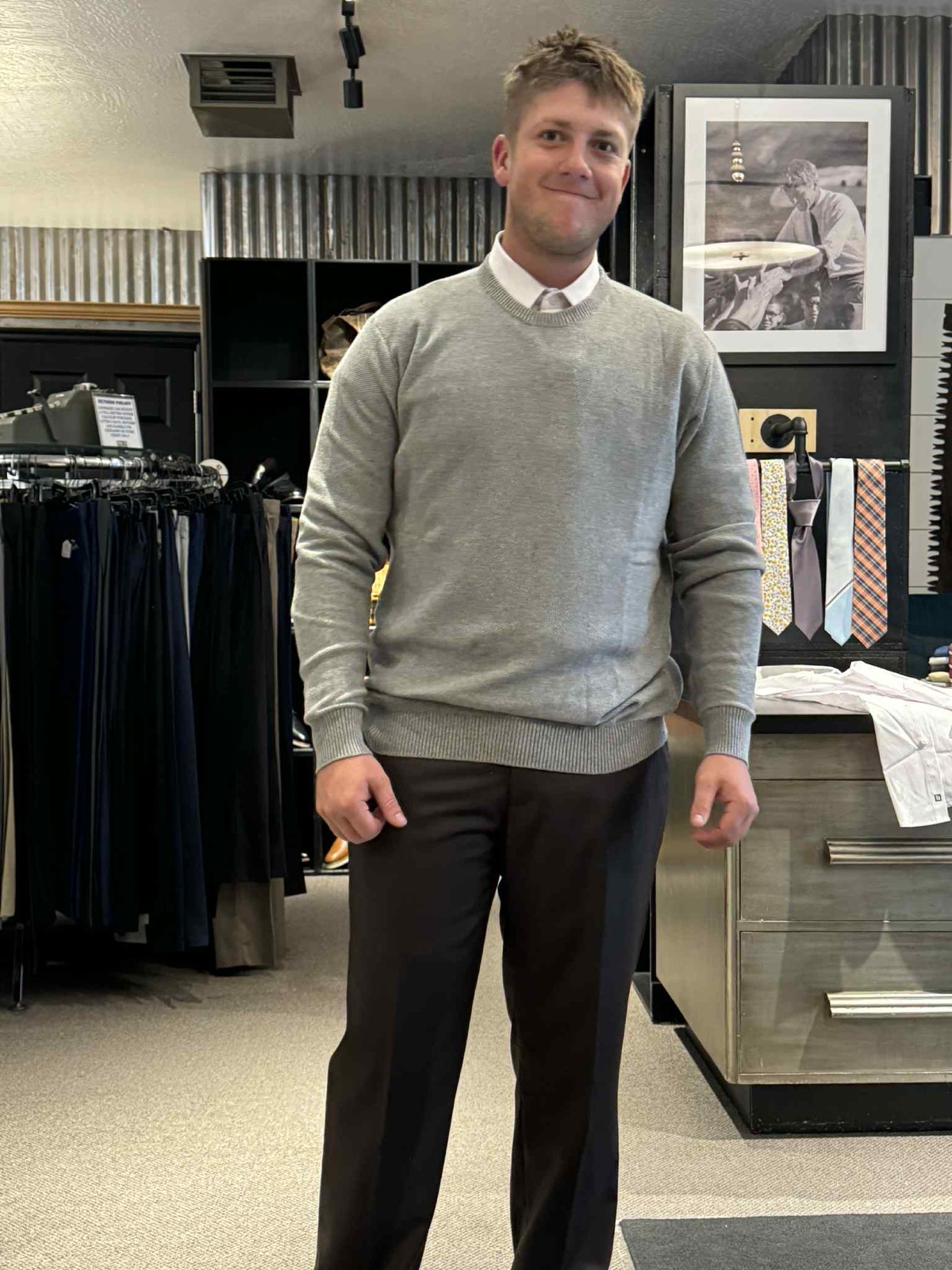 A customer being fitted at Mr S Clothing