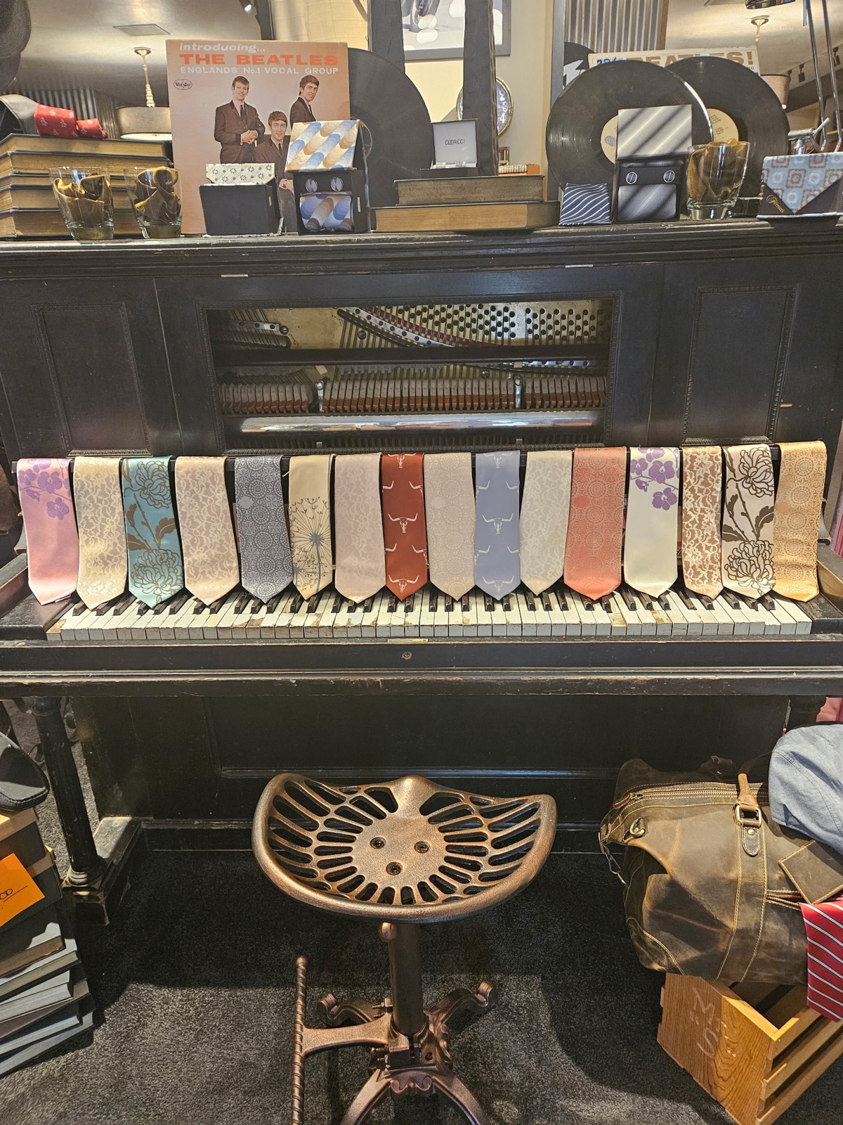 The antique piano used to display ties