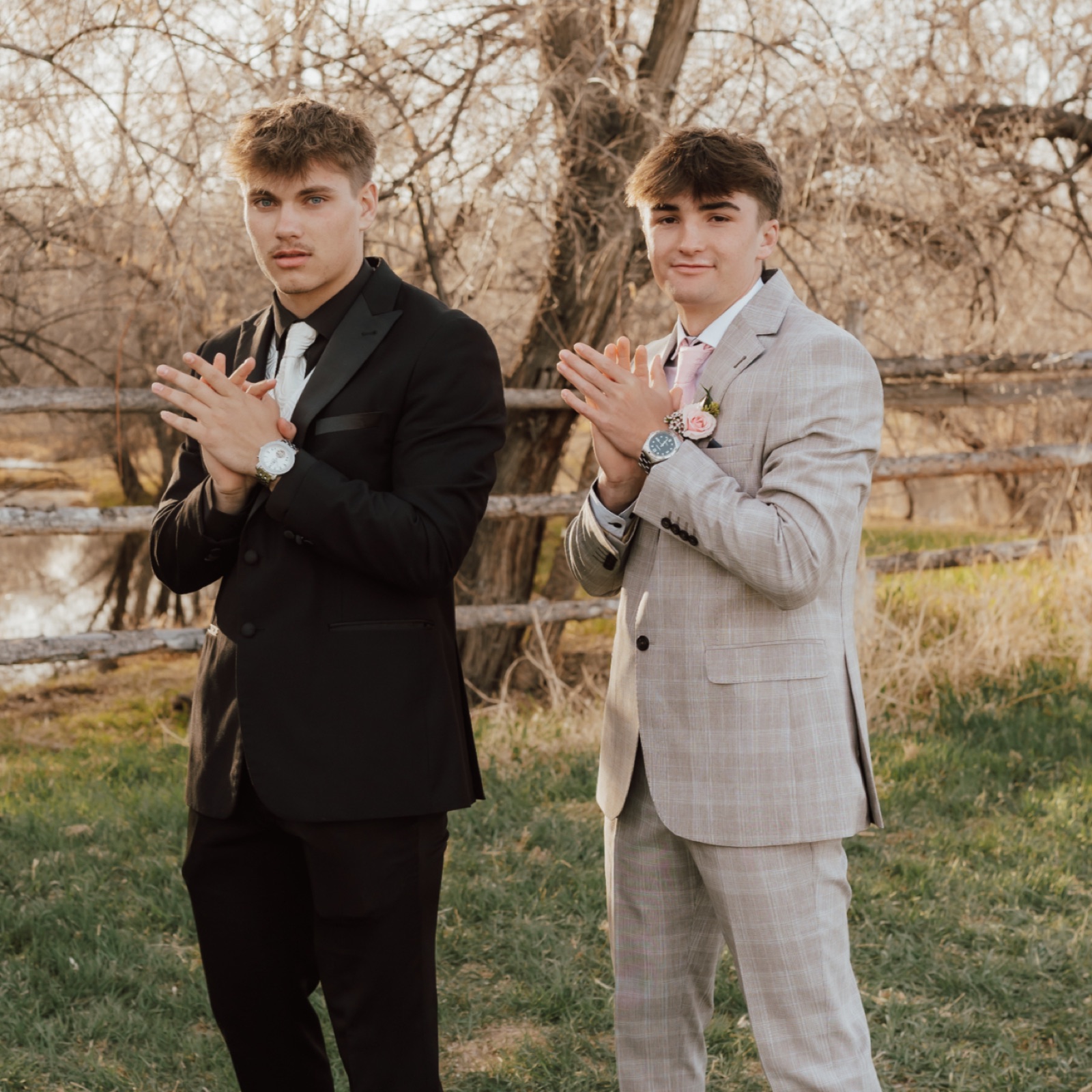 Two young men in suits outdoors in Vernal